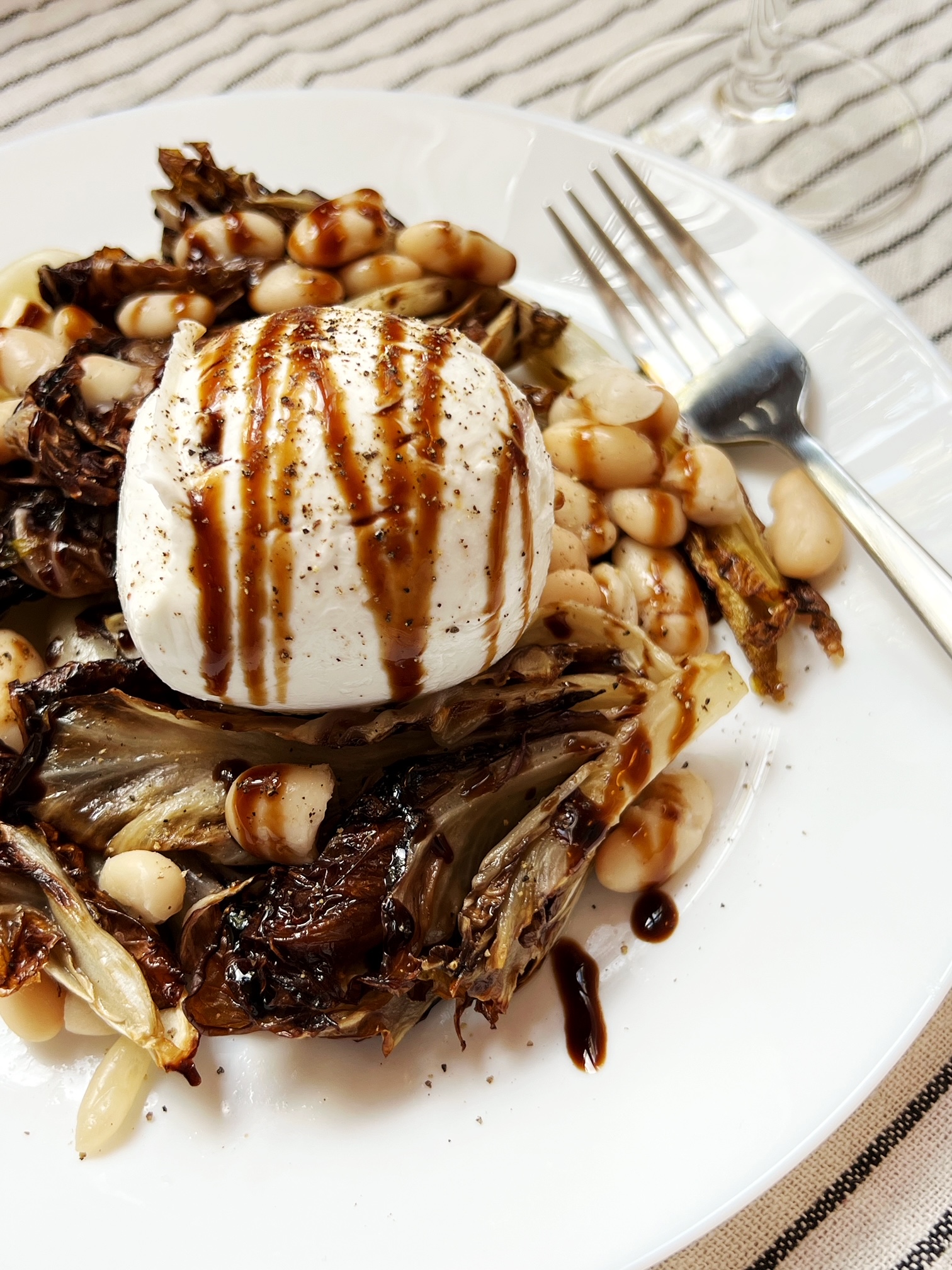 endive radicchio and cannellini bean salad with mozzarella drizzled with balsamic glaze